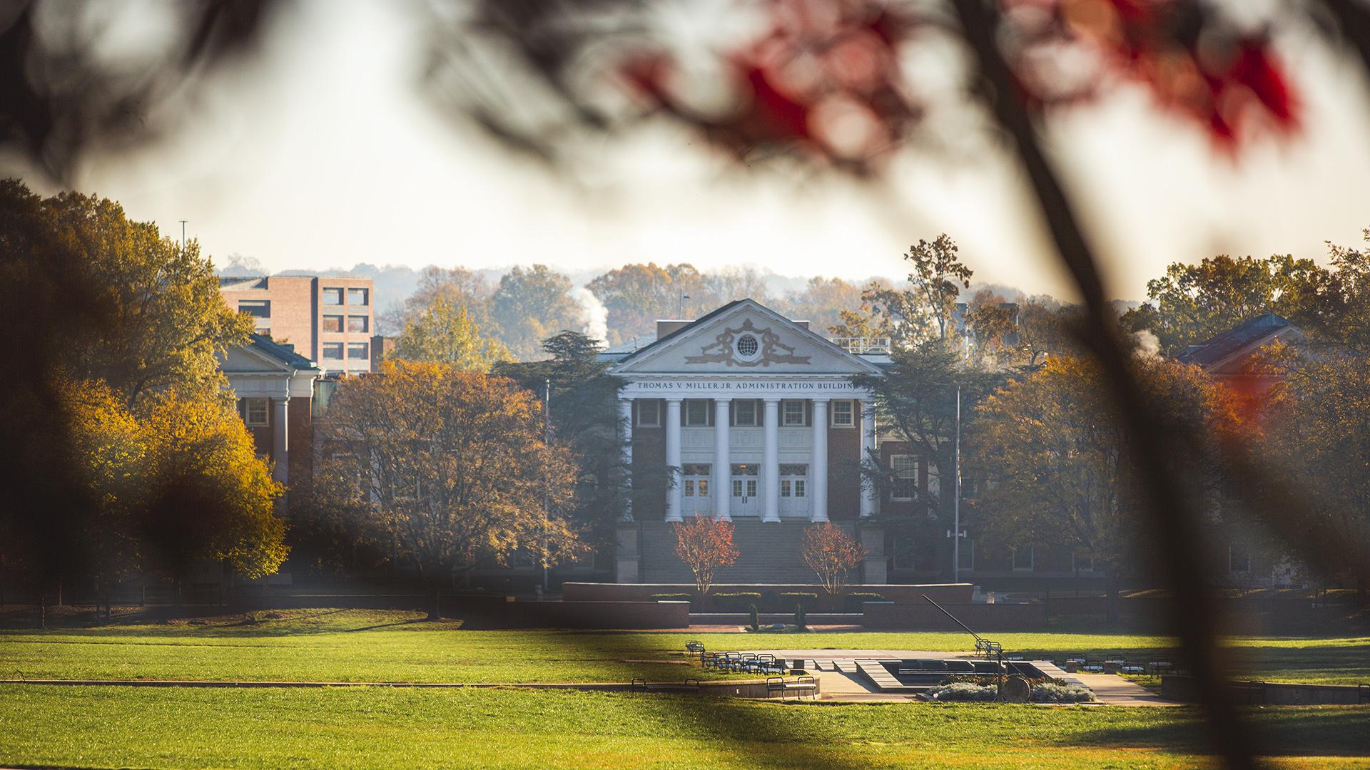 Miller Administration Building surrounded by fall foliage