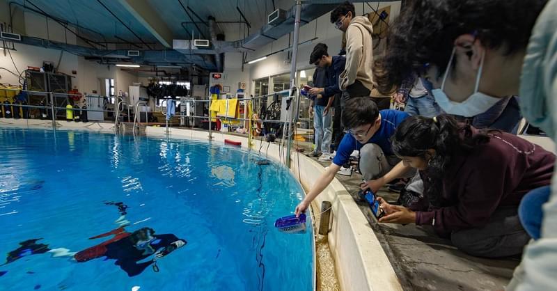 Students doing research at UMD Neutral Bouyancy Tank